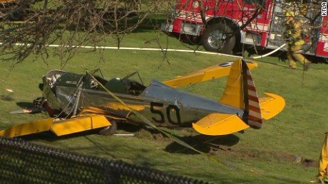 Harrison Ford crash land's dead plane on 8th hole.