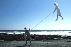 Miss Peregrine's Home For Peculiar Children (2016) | Pers: Asa Butterfield, Ella Purnell | Dir: Tim Burton | Ref: MIS146AG | Photo Credit: [ 20th Century Fox / The Kobal Collection / Maidment, Jay ] | Editorial use only related to cinema, television and personalities. Not for cover use, advertising or fictional works without specific prior agreement